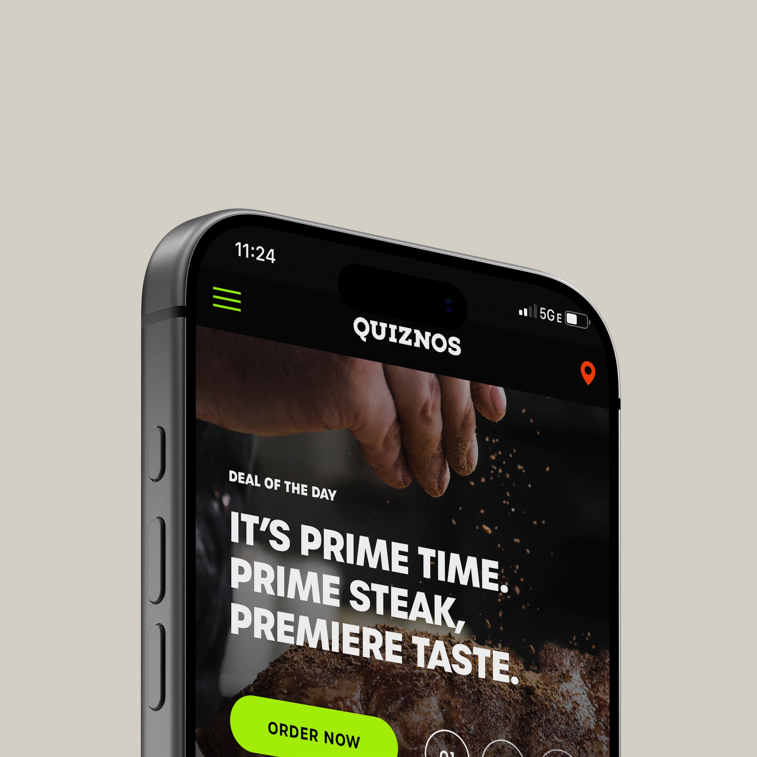Smartphone showing a Quiznos Prime steak promotion with an Order Now button.
